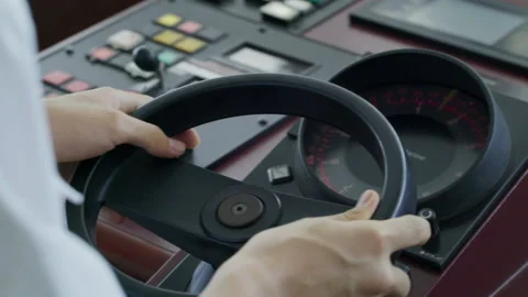 Close Up Of Ship Captain Moving Wheel on freighter,singapore Stock Footage 135076563