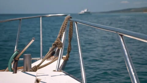 Close Up Of Ship Dropping Anchor On Chain Into Water To Halt Movement. Maritime Video stock 294659135
