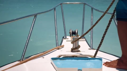 Close Up Of Ship Dropping Anchor On Chain Into Water To Halt Movement. Maritime Stock Footage 294659321