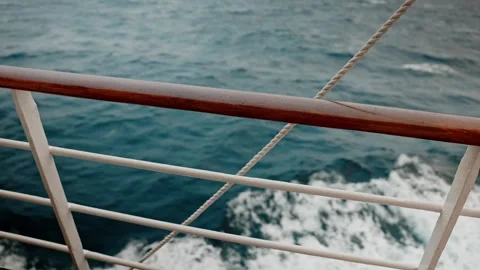 Close-Up of Ship Railing with Waves in Motion – Maritime Journey Aesthetic Stock Footage 315094213