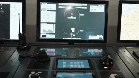 Close-up of a ship simulator's control console and navigation screens Stock Footage 313649271