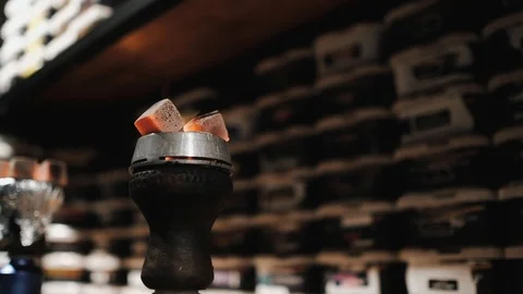 Close-up of shisha hookah with red hot coals. Slow motion. Stock Footage 124647655
