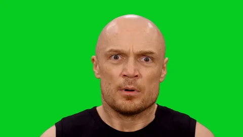 Close up of shocked man making stunned and surprised face on green screen Vídeo Stock 130797080