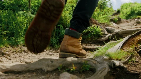 Close-up of shoes, man walking in forest, hiking in the mountains 4K. Stock Footage 234571133