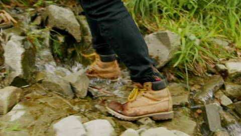 Close-up of shoes, man walking in forest, hiking in the mountains 4K. Stock Footage 234618319