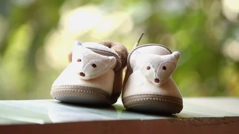 Close-up shoot of baby's shoes Stock Footage 150698395