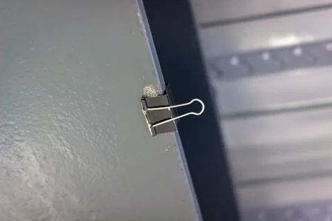 Close-up shoot of binder clip on the ceiling Stock Photos