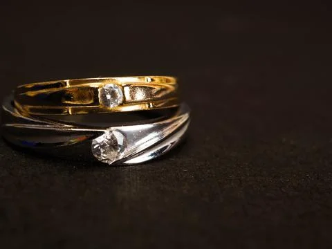 Close up shoot of gold wedding ring with beautiful diamond Stock Photos