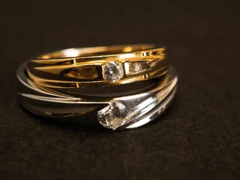 Close up shoot of gold wedding ring with beautiful diamond Stock Photos