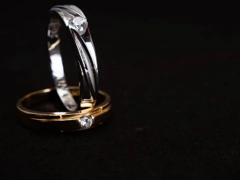 Close up shoot of gold wedding ring with beautiful diamond Stock Photos