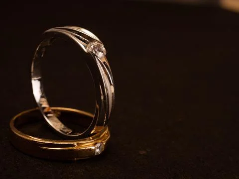 Close up shoot of gold wedding ring with beautiful diamond Stock Photos