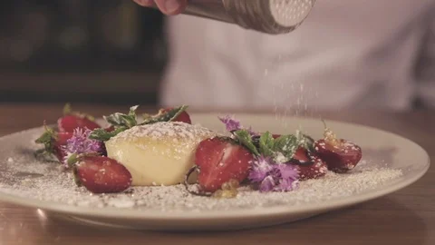 Close Up Shoot it Chef’s Hand preparing Dessert Cake with Sugar Powder in Slow Stock Footage 91107105