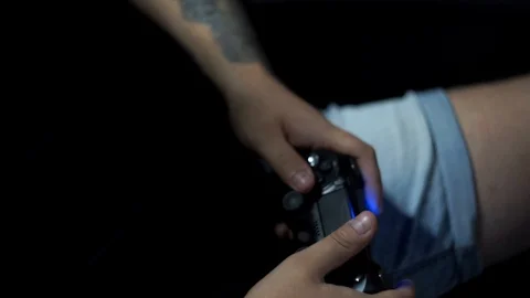 Close up shoot with man's hands keep the joystick. He active play in video game. Stock Footage 110905521