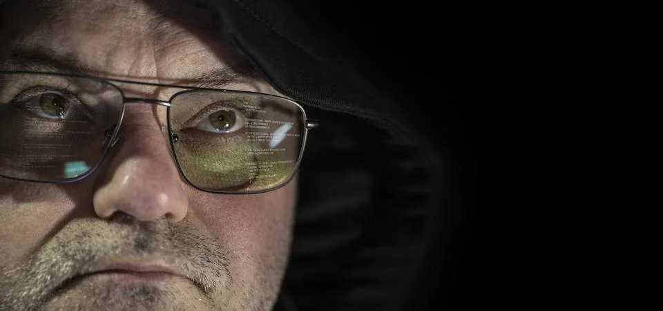 Close-up shooting of a hacker working on a computer for a cyber attack. 写真素材