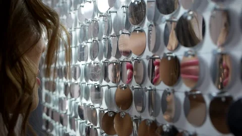 Close up shooting of many mirror reflections of female lips with red lipstick. Stock Footage 144275365