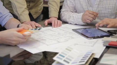 Close up shooting office worker men sitting on chairs looking document Stock Footage 77517013