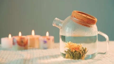 Close-up shooting process of brewing white blooming tea, beautiful yellow flower Stock Footage 311984815
