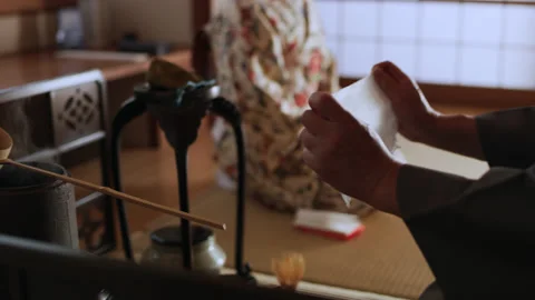 Close up shot on 4k RED camera. Professional tea master preparing a brew during Stock Footage 199462240
