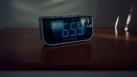 Close up shot of alarm clock turns 7 AM Stock Footage 76430702