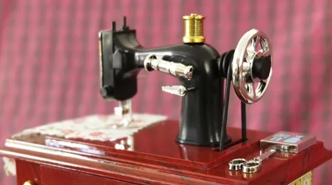 Close up shot of antique Sewing machine model in action with dreamy effect Stock Footage 52906227