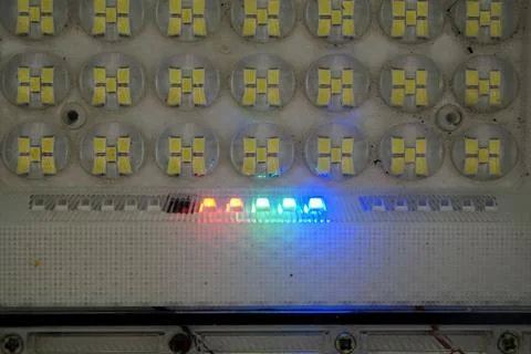 Close-up shot of an array of LED floodlight diodes featuring an active glowing Stock Photos