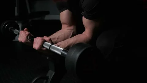 Close shot of athletic man doing wrist bending Stock Footage 142279857