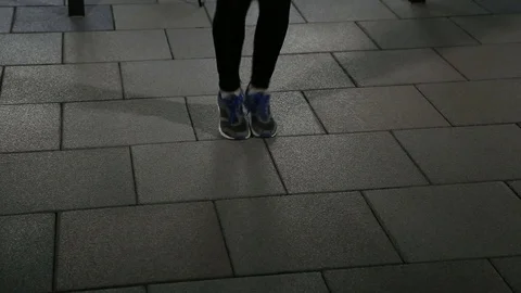Close up shot of an athletic man skipping fancily with a jump rope Stockbeeldmateriaal 73930717