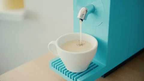 Close up shot of automatic capusle coffee machine pouring espresso coffee at Stock Footage 89344074