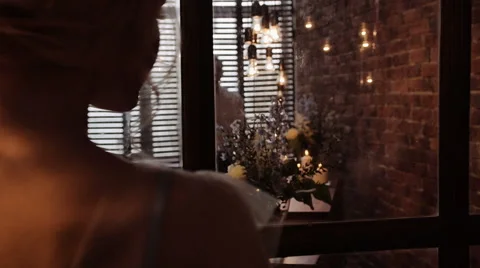 Close up shot from the back of the bride and silhouette of her groom Video stock 61966058