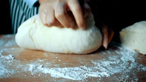 Close up shot of bakery worker knead flour bread Baker making dough with na.. Stock Footage 272566190