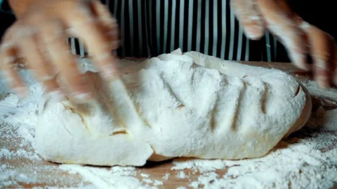 Close up shot of bakery worker knead flour bread Baker making dough with na.. Stock Footage 272566197