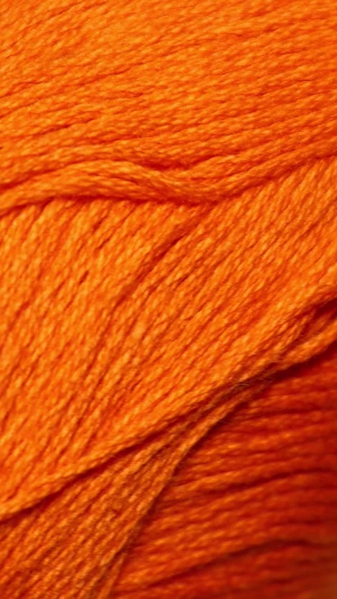 A close up shot of a ball of yarn, perfect for craft or textile related pro.. Stock Footage 344158737
