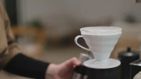 Close up shot of barista making filter coffee with funnel Stock Footage 232204034