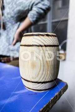 Close-up shot of barrel shaped penny bank design made by craftsman Stock Photos