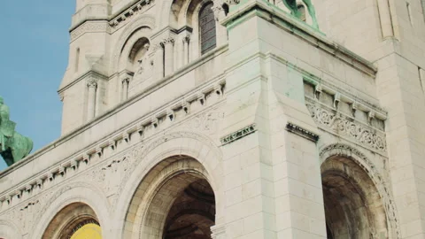 Close up shot of a basilica facade, with arched windows in Paris Stock Footage 313457293