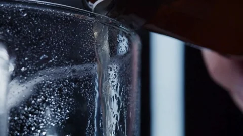 Close up shot of a beer mug being filled with beer. Slow Motion. High quali.. Stock Footage 265837571