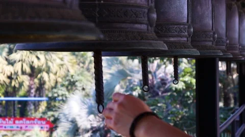 Close up shot of the bell with hand Stock Footage 101245041