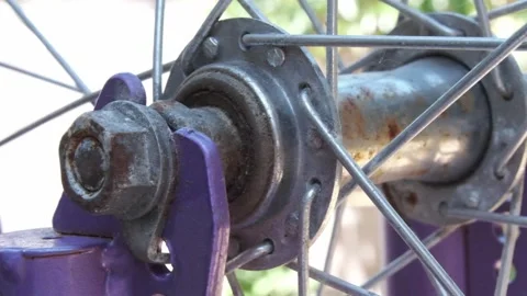 Close up shot of a bicycle fork and spokes and components 스톡 동영상 313089139
