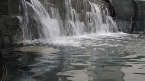 Close shot on big beautiful artificial waterfall indoor Stock Footage 59979697