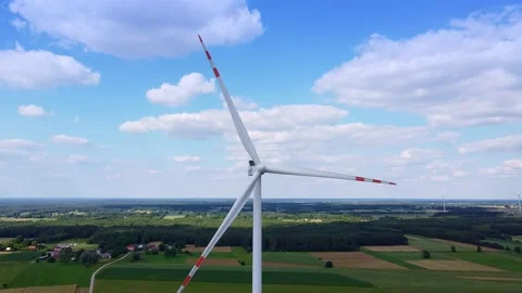 Close up shot of big windmill on the blue sky Stock Footage 143352398
