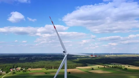 Close up shot of big windmill on the blue sky Stock Footage 143404240
