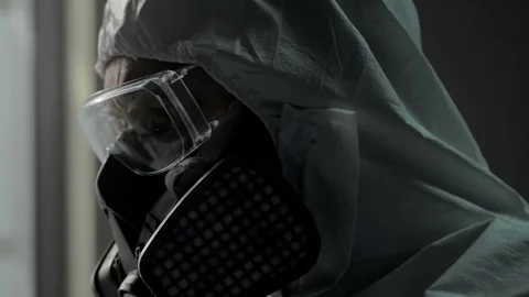 Close shot from bio laboratory. Professional scientist holds bunch of bananas in Stock Footage 72508955