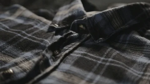 A close-up shot of a black and blue checkered pattern in a polo. - Stock Footage 128358611