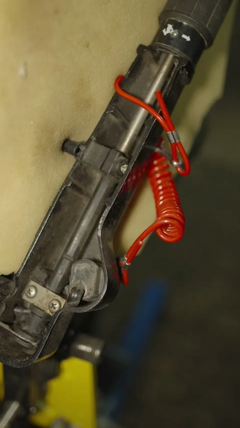 A close-up shot of a black control tiller arm Stock Footage 340818862