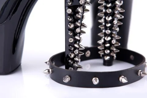 Close-up shot of black high heel shoes with spikes Foto stock