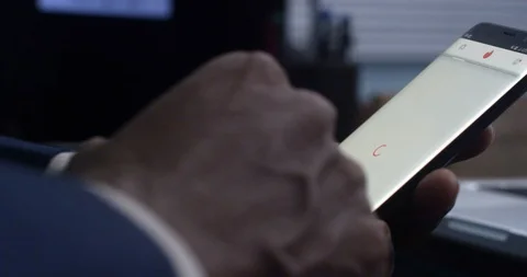 Close up shot of Black mans hands using a mobile phone Video stock 109832772