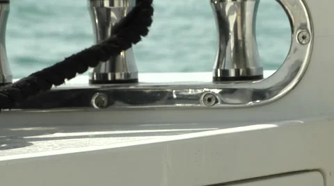 Close shot of black rope seen tied on a boat. Stock Footage 46863452
