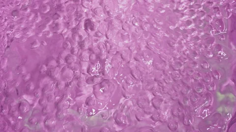 Close-up Shot of Boiling Purple Liquid Bubbles in Motion 動画素材 347172154
