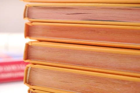 A close-up shot of book stack. Stock Photos