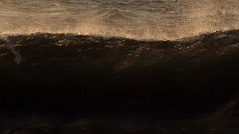 Close up  shot of the breaking wave, sunset, slow motion Video stock 94682279